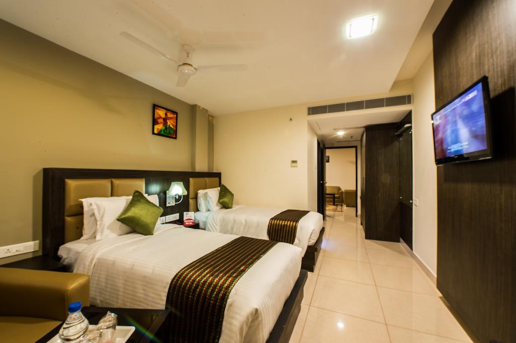 Plaza Hotel Trichy Tiruchirappalli Szoba fotó