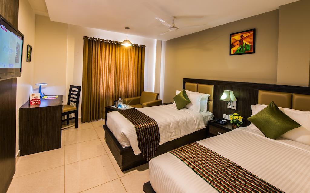 Plaza Hotel Trichy Tiruchirappalli Szoba fotó
