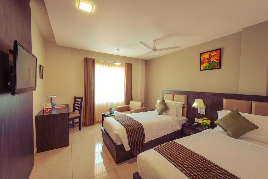 Plaza Hotel Trichy Tiruchirappalli Szoba fotó